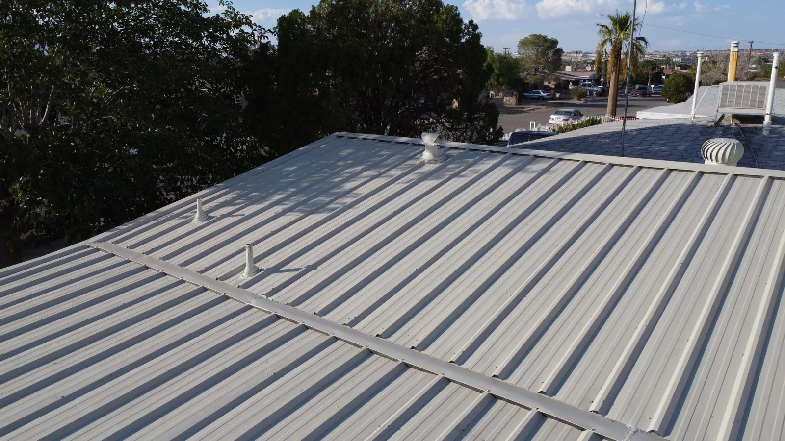 Light Stone R-panel metal roof installed by Manifest Metals on an El Paso home